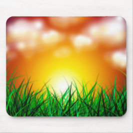 Schöner Sonnenaufgang über einem Grasfeld Mousepad