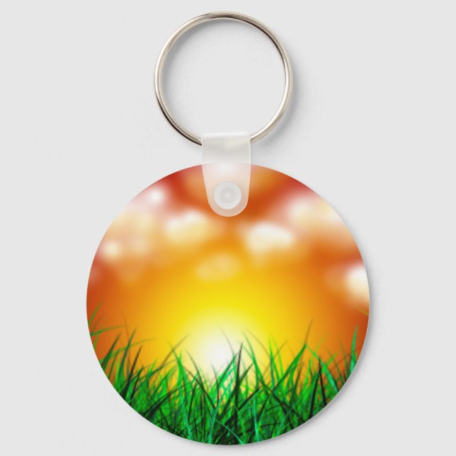 Schöner Sonnenaufgang über einem Grasfeld Schlüsselanhänger (Vorderseite)