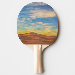 Schöner Sonnenaufgang über Sanddünen auf Holz Tischtennis Schläger