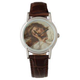 Schönes Mädchen liegt im Bett mit rotem Haar Armbanduhr