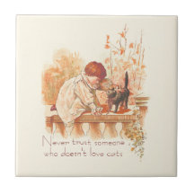 Schönes, rot gekleidetes Kind mit Kätzchen Zitat