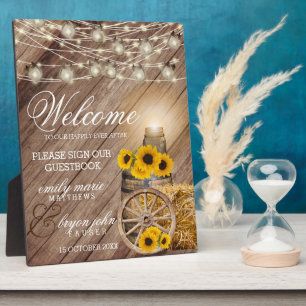 Schönes rustikales Holzfass und Sonnenblumen Fotoplatte