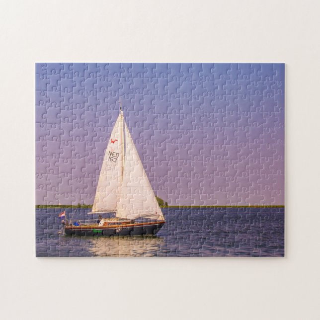 Schönes Segelboot bei Sonnenuntergang, Niederlande Puzzle (Horizontal)