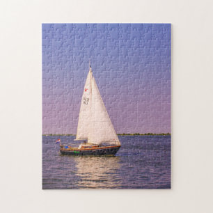 Schönes Segelboot bei Sonnenuntergang, Niederlande Puzzle