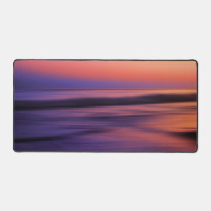Schönes Sonnenuntergangsbild im Ozean Schreibtischunterlage