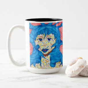 Schönheit in blauer Tasse