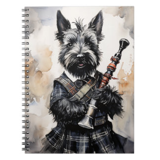 Schottische Terrier spielen Bagpipe in einer Kilot Notizblock