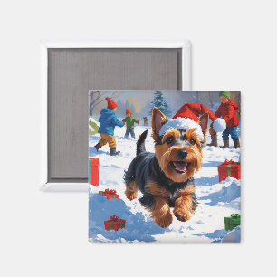 Schottischer Terrier läuft durch Schnee mit Weihna Magnet