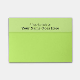 SCHREIBTISCH-Anmerkungsorganisator der grünen Post-it Klebezettel