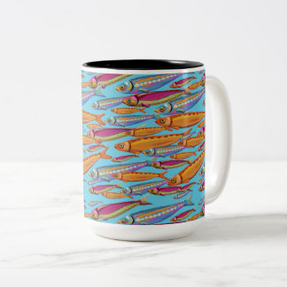 Schule für Tasse von farbigen Fischen
