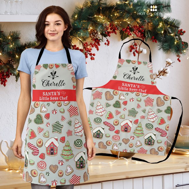 Schürze des Weihnachtsmanns mit seinem kleinen, sc (Create delicious holiday meals this season in this adorable Santa's Little Sous Chef Apron.)