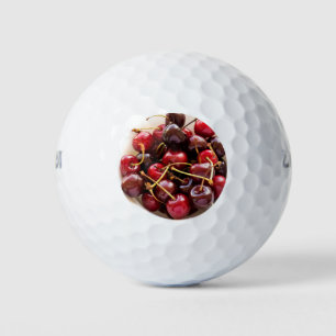 Schüssel mit Kirschen Golfball