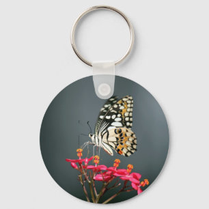 Schwarz-Gelb-Schmetterling auf rosa Blume Schlüsselanhänger