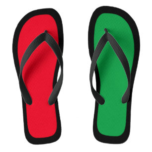 Schwarz getrimmte Flip Flops mit Backbord- und Ste