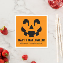 Schwarz glückliche Halloween Kürbisfaceform auf Or Serviette