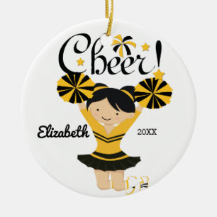 Schwarz-goldene Cheerleaderin mit schwarzen Haaren Keramikornament