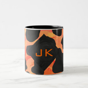 Schwarz-Orange-Print, Monogram-Kuh Zweifarbige Tasse