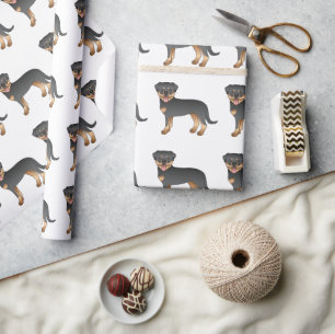 Schwarz-Rot-Rottweiler Süßes Cartoon-Hund-Muster Geschenkpapier