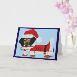 Schwarz-roter Dachshund Weihnachtsmann mit einem Z Karte