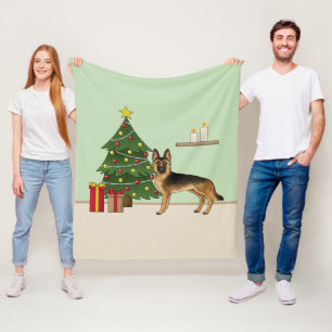 Schwarz-roter deutscher Schäferhund und ein Weihna Fleecedecke