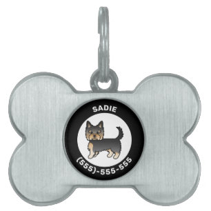 Schwarz und Braun Yorkshire Terrier mit Namen und  Tiermarke