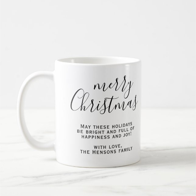 Schwarz und Weiß frohe Weihnachtskritik wünscht Kaffeetasse (Links)