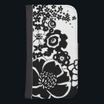 Schwarz-Weiß-Blumengarten Grafisches Muster Phone Geldbeutel<br><div class="desc">Ein grafisches Muster,  das eine schwarz-weiße Blumengartenszene zeigt,  die von Chariklia Zarris kreiert wurde. Selbst mit nur zwei Farben ist das Bild fast überwältigend in seiner Schönheit. Gönnen Sie sich eine wunderbare Blumenausstellung,  indem Sie diesen Print heute kaufen!</div>