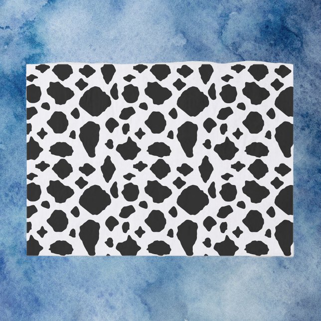 Schwarz-Weiß-Kuh-Muster Seidenpapier (Tissue paper with a black and white cow pattern.)