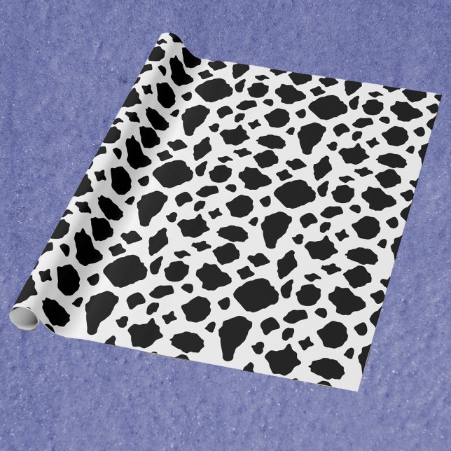 Schwarz-Weiß-Kuhdruckmuster Geschenkpapier (A wrapping paper with a black and white cow print.)