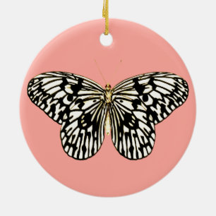 Schwarz-Weiß-Schmetterling, korallenrosa Hintergru Keramik Ornament