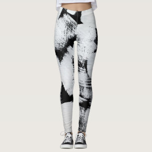 Schwarz-weiße, abstrakt gestrichene Leinwand. Leggings