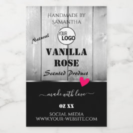 Schwarz-weiße Etiketten von Holzkörnern Herzlogos