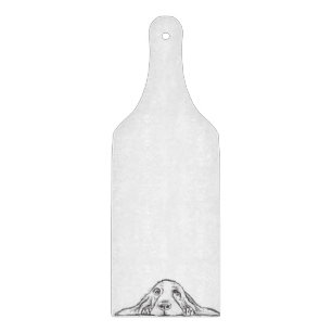 Schwarz-weiße Hundeaugen Schneidebrett