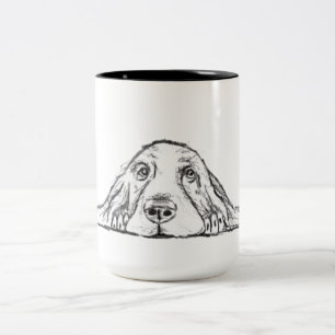 Schwarz-weiße Hundeaugen Zweifarbige Tasse