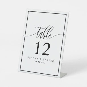Schwarz-weiße Kalligrafie-Hochzeitstisch-Nummer Sockelschild