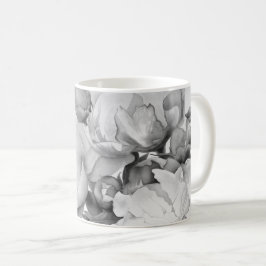 Schwarz-weiße Peelingkunst elegante Blumenkunst Kaffeetasse