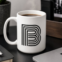 Schwarz-weißer Anfangsbuchstabe für die Minimal-Mo Kaffeetasse