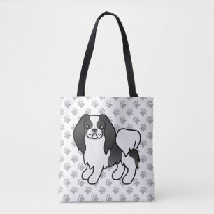 Schwarz-weißer japanischer Chin-Cartoon-Hund & Pfo