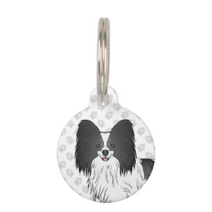 Schwarz-weißer Papillon-Cartoon-Hundekopf Haustiermarke