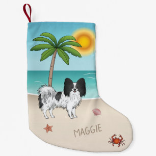 Schwarz-weißer Papillon-Hund am tropischen Sommers Kleiner Weihnachtsstrumpf