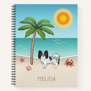 Schwarz-weißer Papillon-Hund am tropischen Sommers Notizbuch