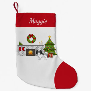 Schwarz-weißer Papillon in einem Weihnachtszimmer Kleiner Weihnachtsstrumpf