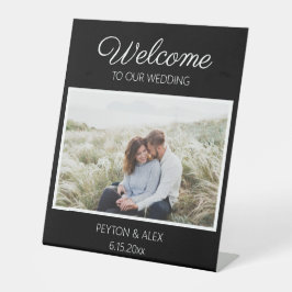 Schwarz-weißes Begrüßungsdatum des Fotos Sockelschild