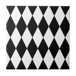 Schwarz-weißes Harlequin Diamonds-Musterdesign Fliese