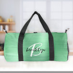 Schwarz-weißes Monogramm aus lackiertem, grün gebü Duffle Bag<br><div class="desc">Diese personalisierte Duffeltasche hat ein Monogramm und Vorname in modernem Schwarz-Weiß-Skript auf einem Glam Minz grünen Imitat gebürstet Metall Hintergrund.</div>
