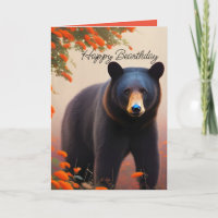 Schwarzbär in orangen Blumen