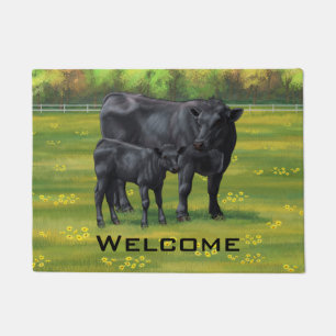 Schwarze Anguskühe und Niedliches Kalb im Sommerwe Fußmatte