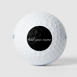 Schwarze feste Hinzufügen-Name-Textnachricht hier Golfball