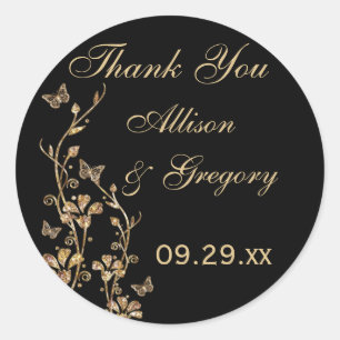 Schwarze, goldene Flora mit Schmetterlingskleber Runder Aufkleber