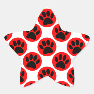 Schwarze Hundepaws in roten Polka-Punkten Stern-Aufkleber
